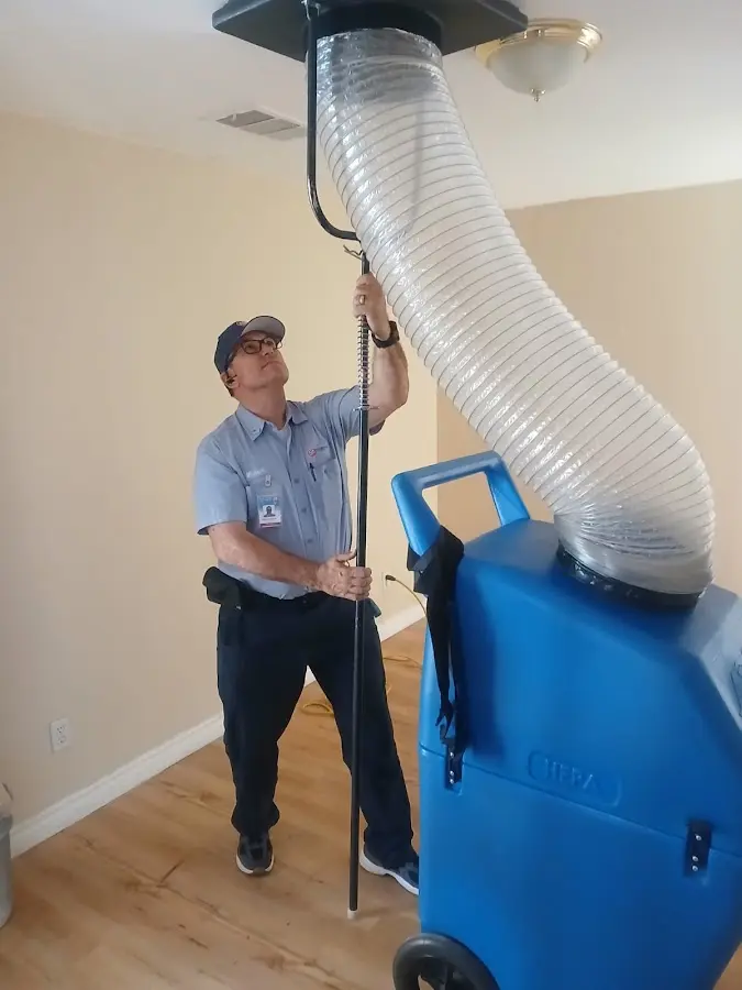 HVAC Installation technician using HEPA equipment in Shirley